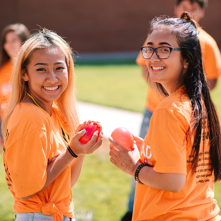 Students holding their water balloons.